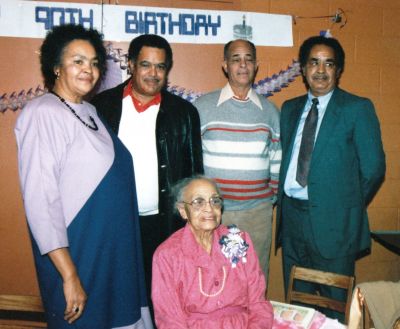 Gathering for the 90th
(Left to Right) Gloria Nelda Harvey Robinson, Randolph Harvey, Joseph T. Harvey, William Thomas Harvey, and (Bottom) Lula Virginia Harvey gether for Lula Virgina's 90th birthday.
