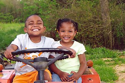 Teran (Davis) Rhodes & Lekea Janae Boney
Taken 2005 in Rich Square, NC on Uncle Gaston Tann's Tractor.
Davis is the Son of Sonya Mainor Rhodes, the Grandson of Carolyn Melton Mainor, the Great Grandson of Beulah Baugham Melton and the Great Great Grandson of Mariah Harvey Baugham.
Lekea is the Daughter of Kema Manior Boney, the Granddaughter of Carolyn Melton Mainor, the Great Granddaughter of Beulah Baugham Melton and the Great Great Granddaughter of Mariah Harvey Baugham.
