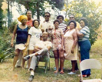 The Baugham Siblings
Back Row: William "Pap" Baugham, Oliver Wendell "Wimpy" Baugham, Harvey Baugham, and Morris "Bump" Baugham.
Middle Row: Evelyn Baugham Ward, Ludaine "Jackie" Rudisille, Flora Baugham, Beulah Baugham Melton, and Geraldine Baugham Tann.
Front (seated): George "Connie" Baugham
All of these are the children of Mariah Harvey Baugham and the grandchildren of William and Rebecca Scott Harvey.
