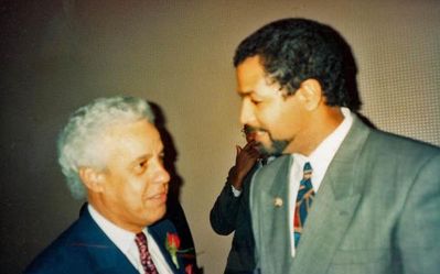 Danny Sexton with VA Governor Douglas Wilder 
Taken in 1994 in Atlanta, GA at the Governor's Ball
Danny is the Son of Wm. Daniel Harvey Jr., the adopted Son of Mabel O. Harvey Sexton and the Grandson of Wm. Daniel Harvey Sr. 
Keywords: Angelo Danny Sexton