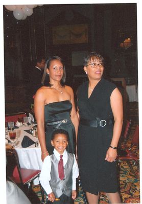 Dorna Florenza Conwell-Stover -  Daughter-in-law and Grandson
Taken 2008 at 50th Birthday party of sister Arleene Conwell in Greensboro, NC
Dorna - Daughter of Lucille L. Ray Conwell
Granddaughter of Alice Mae Harvey Ray 
Keywords: Dorna Conwell