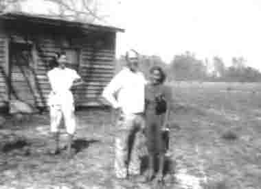 James Preston Harvey & Unknown
Preston and 2 young ladies in Rebecca Scott Harvey's yard in Rich Square, NC
Can anyone identify the females?
Keywords: James Preston Harvey